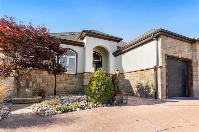 view of front of home with a garage