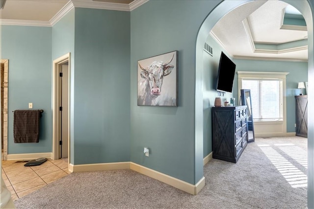 interior space featuring ornamental molding and carpet floors