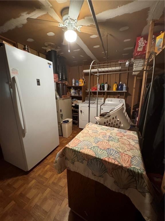 bedroom with parquet flooring, washing machine and dryer, ceiling fan, and white fridge