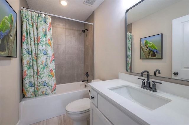 full bathroom featuring vanity, toilet, and shower / bathtub combination with curtain