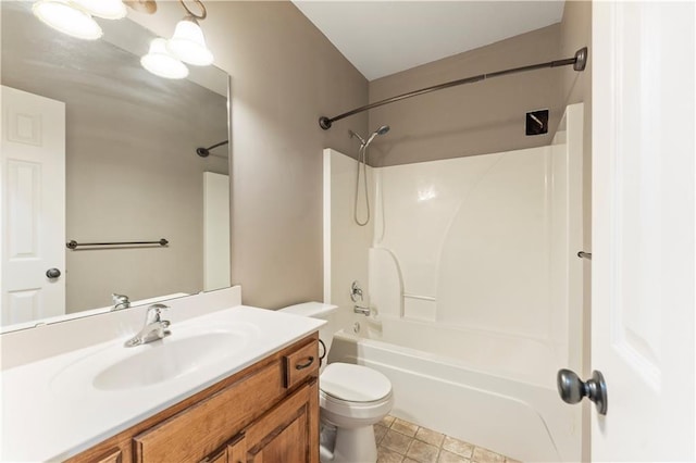 full bathroom with tile patterned floors, vanity, toilet, and shower / tub combination