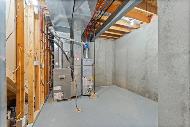 utility room featuring water heater