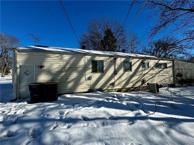 view of snow covered property