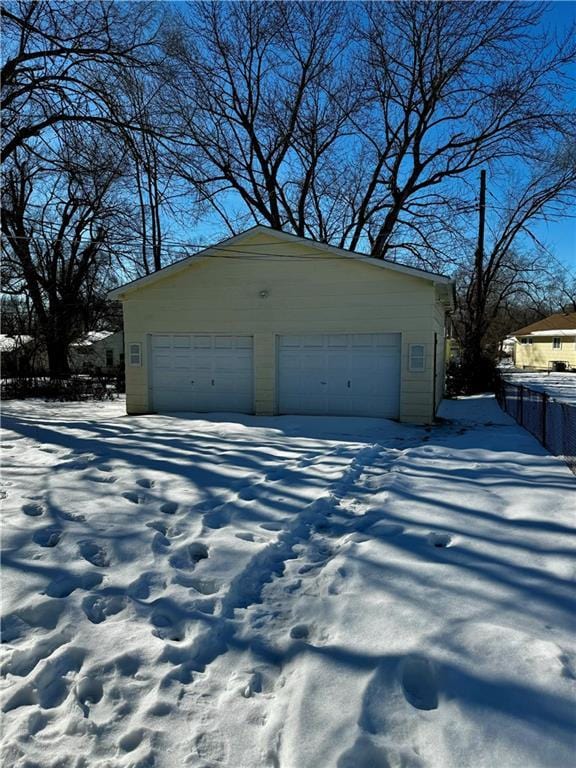 view of snow covered garage