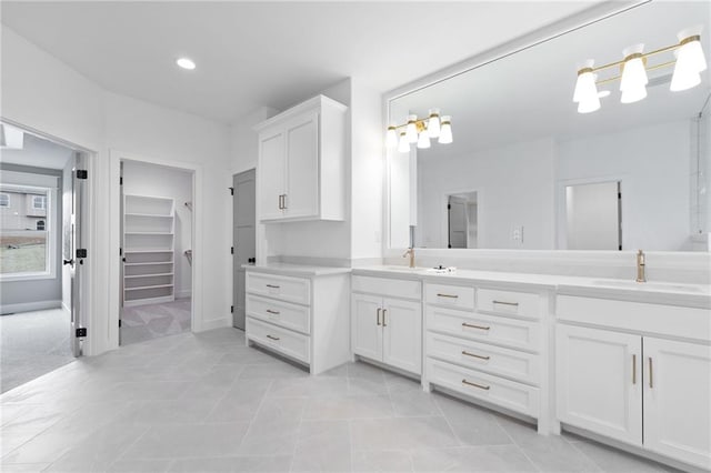 bathroom featuring vanity and tile patterned flooring