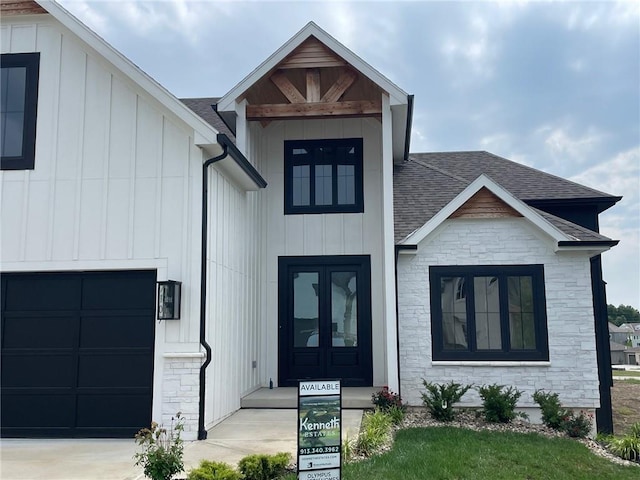 doorway to property featuring a garage