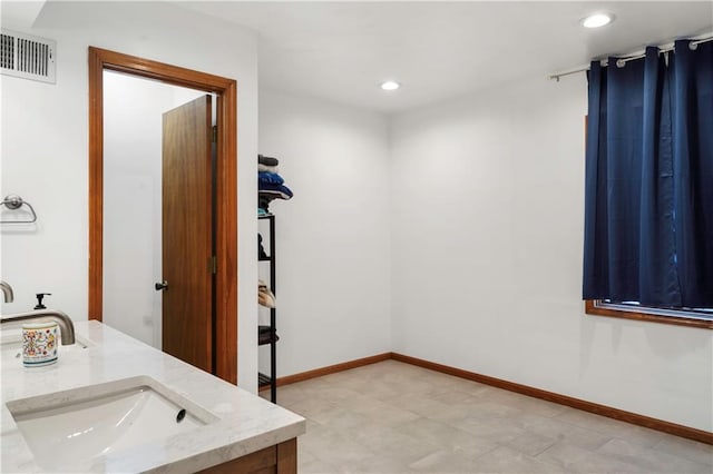 bathroom featuring vanity