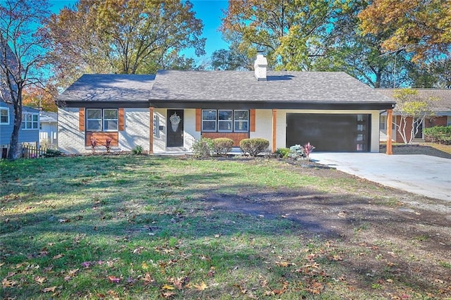 ranch-style house featuring a front lawn and a garage