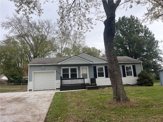 ranch-style home with a garage and a front yard