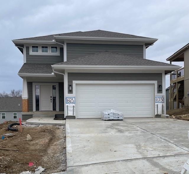 view of front of house with a garage