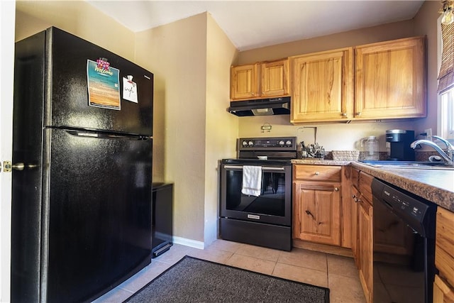 kitchen with black appliances, light tile patterned flooring, and sink