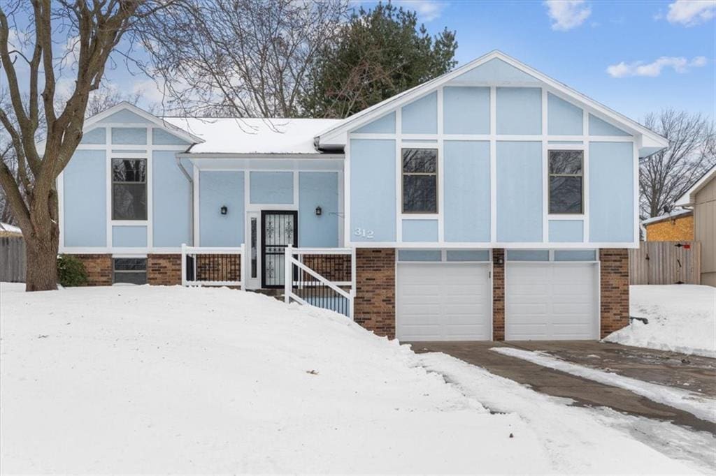 view of front of property with a garage