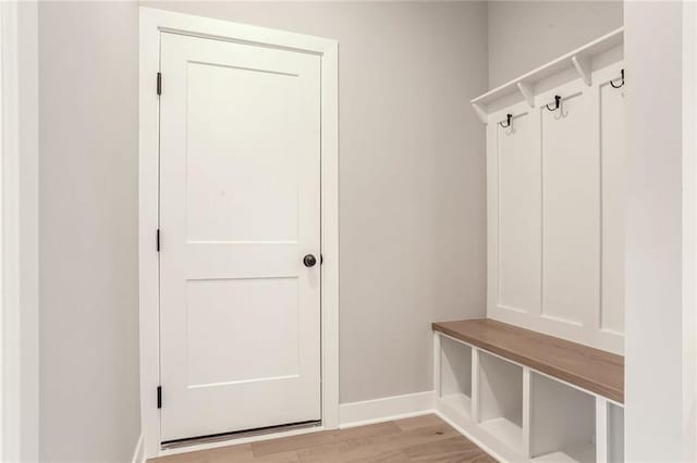 mudroom with light hardwood / wood-style flooring