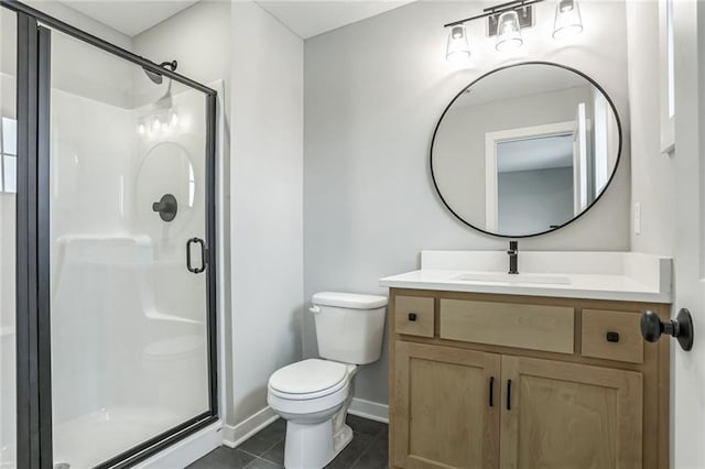 bathroom with vanity, an enclosed shower, tile patterned floors, and toilet