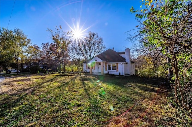 exterior space featuring a front lawn