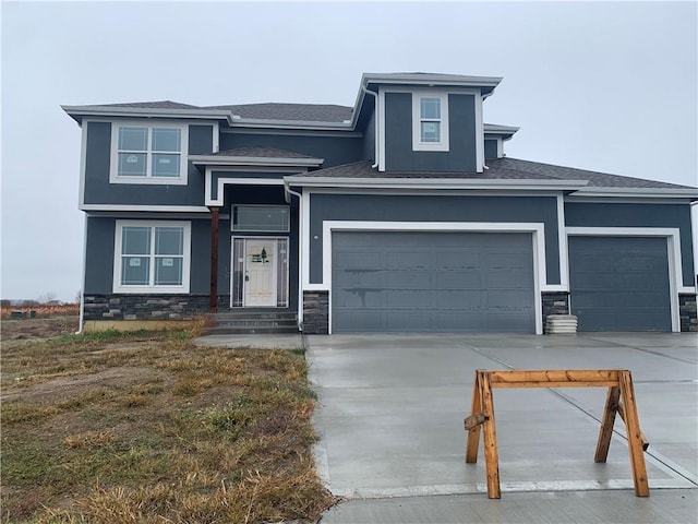 prairie-style house featuring a garage