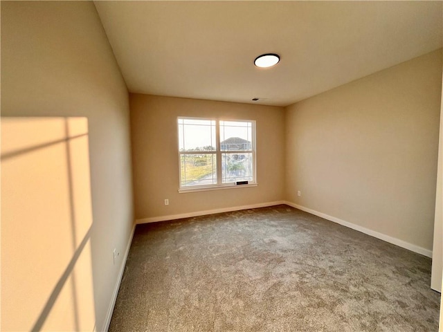 unfurnished room featuring carpet floors