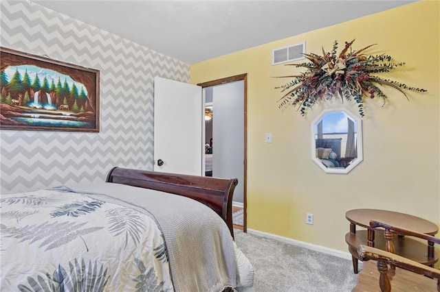 bedroom with light colored carpet