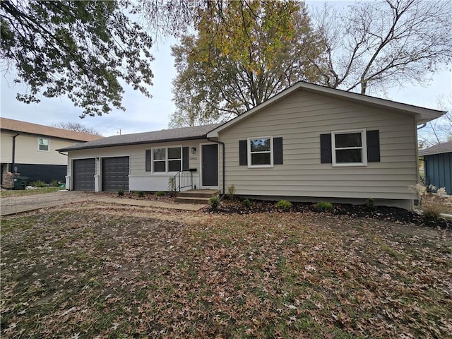 single story home with a garage