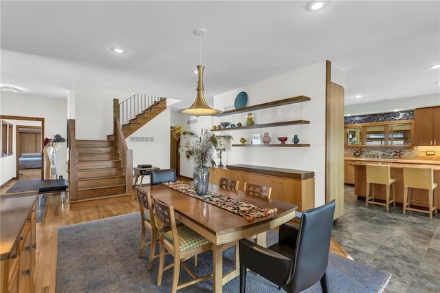 32225 W 88th St, De Soto, KS 66018 - dining room featuring recessed lighting, visible vents, and stairway