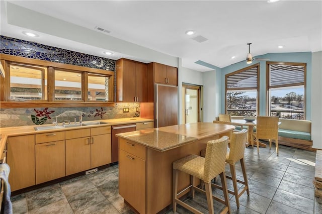 32225 W 88th St, De Soto, KS 66018 - kitchen featuring built in refrigerator, visible vents, dishwasher, a sink, and stone tile flooring