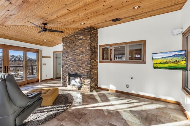 32225 W 88th St, De Soto, KS 66018 - living room with baseboards, wooden ceiling, a ceiling fan, a fireplace, and vaulted ceiling