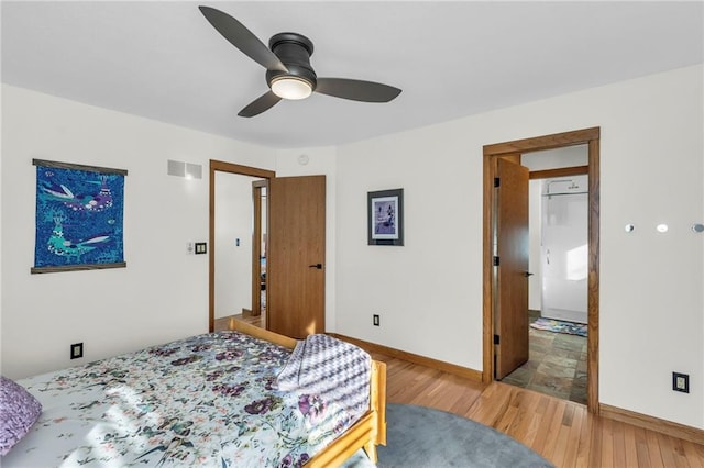 32225 W 88th St, De Soto, KS 66018 - bedroom with light wood finished floors, visible vents, baseboards, and ceiling fan