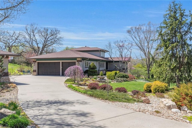 32225 W 88th St, De Soto, KS 66018 - view of front of home featuring an attached garage and concrete driveway
