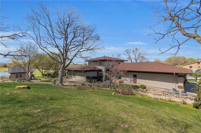 32225 W 88th St, De Soto, KS 66018 - exterior space featuring a yard and stucco siding