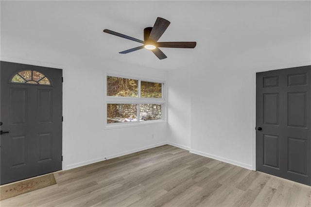 entrance foyer featuring light wood-type flooring and ceiling fan