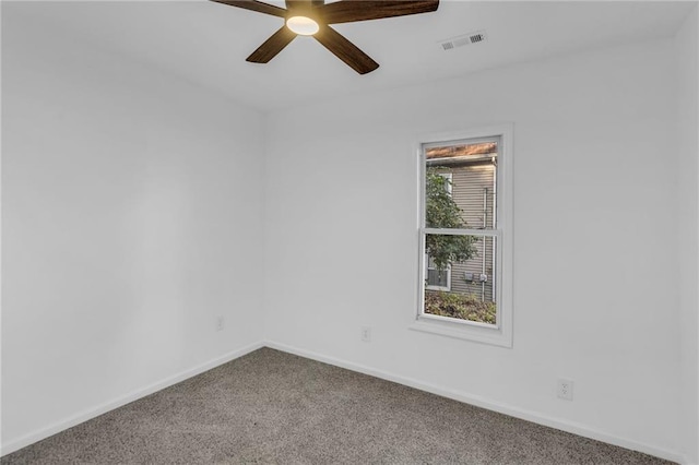 empty room with carpet flooring