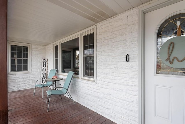 wooden terrace with covered porch