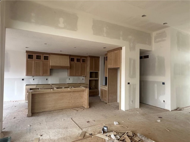 kitchen featuring premium range hood