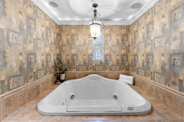 bathroom with crown molding and tiled bath