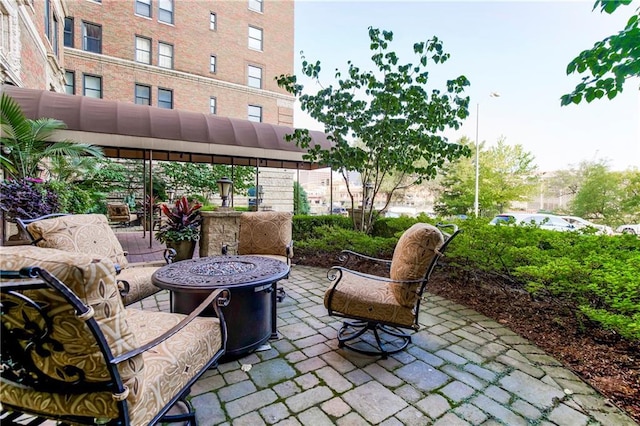 view of patio / terrace with a fire pit