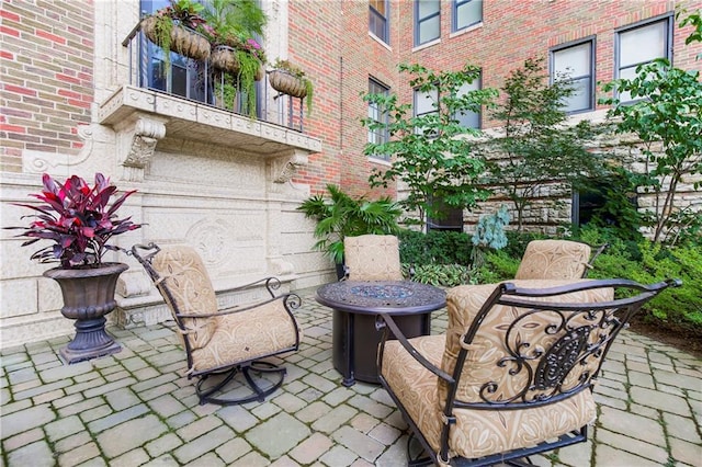 view of patio featuring a fire pit