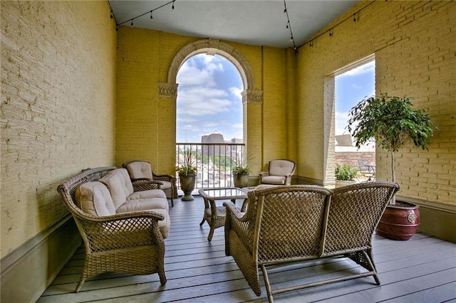 balcony with an outdoor hangout area