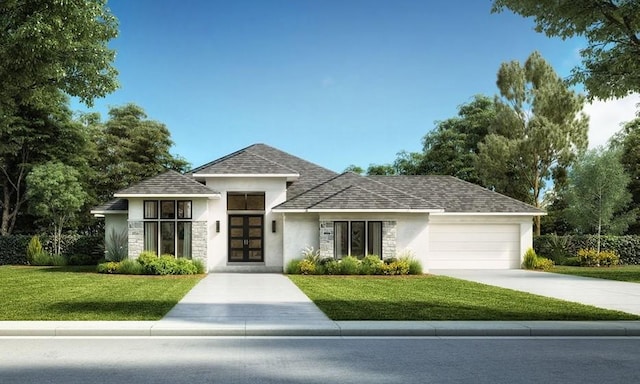 view of front of house with a garage and a front yard