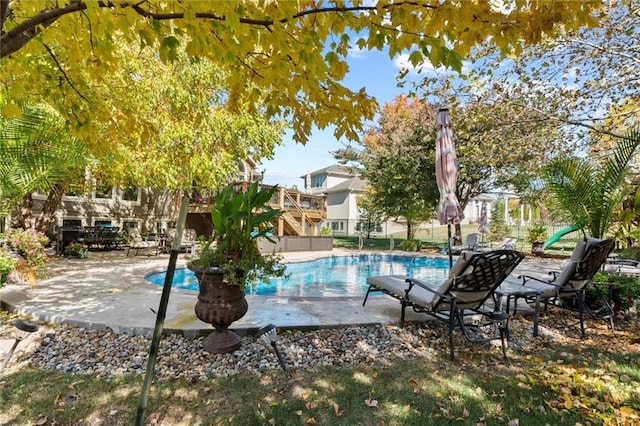 view of pool with a patio area