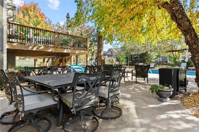 view of patio / terrace with a pool side deck