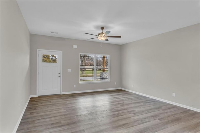 interior space featuring light hardwood / wood-style floors and ceiling fan