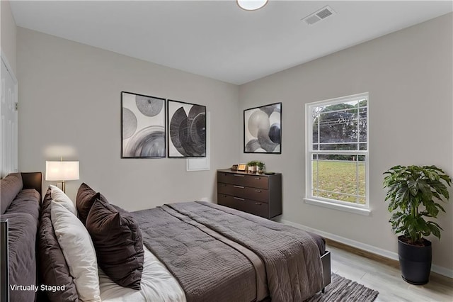 bedroom featuring light wood-type flooring