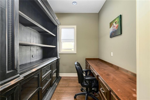 office with dark hardwood / wood-style floors