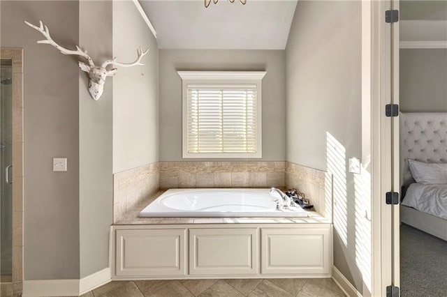 bathroom with independent shower and bath and vaulted ceiling