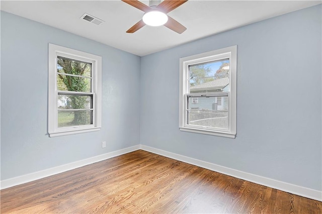 unfurnished room featuring ceiling fan and wood-type flooring