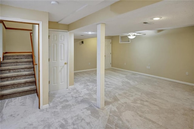 basement with light colored carpet