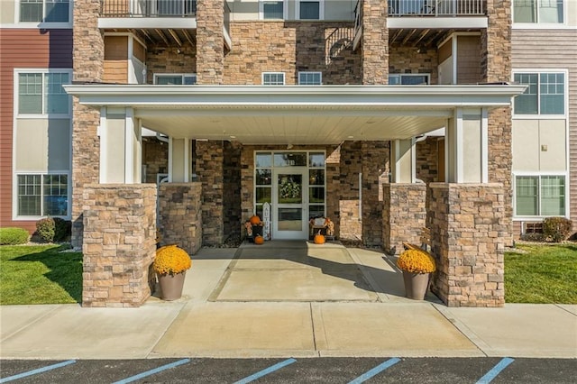 property entrance with a balcony