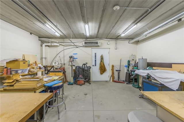 basement featuring a wall mounted AC