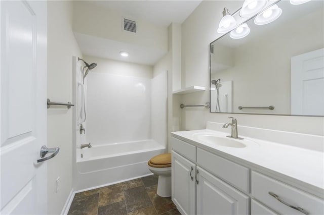 full bathroom with toilet, vanity, and shower / bath combination