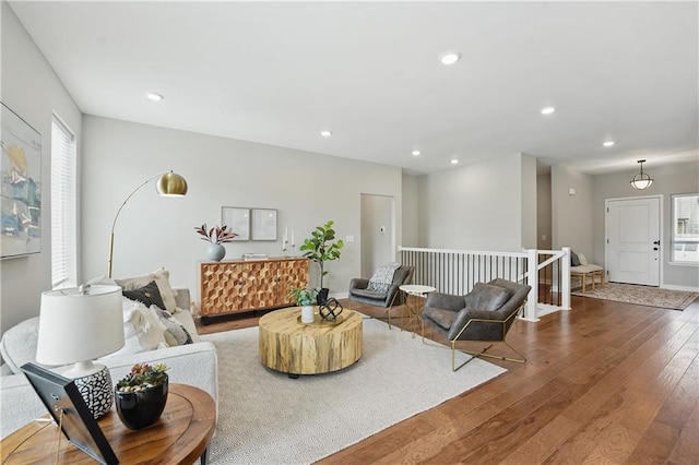 1024 Branchwood Ln, Raymore, MO 64083 - living room with hardwood / wood-style floors, recessed lighting, and healthy amount of natural light